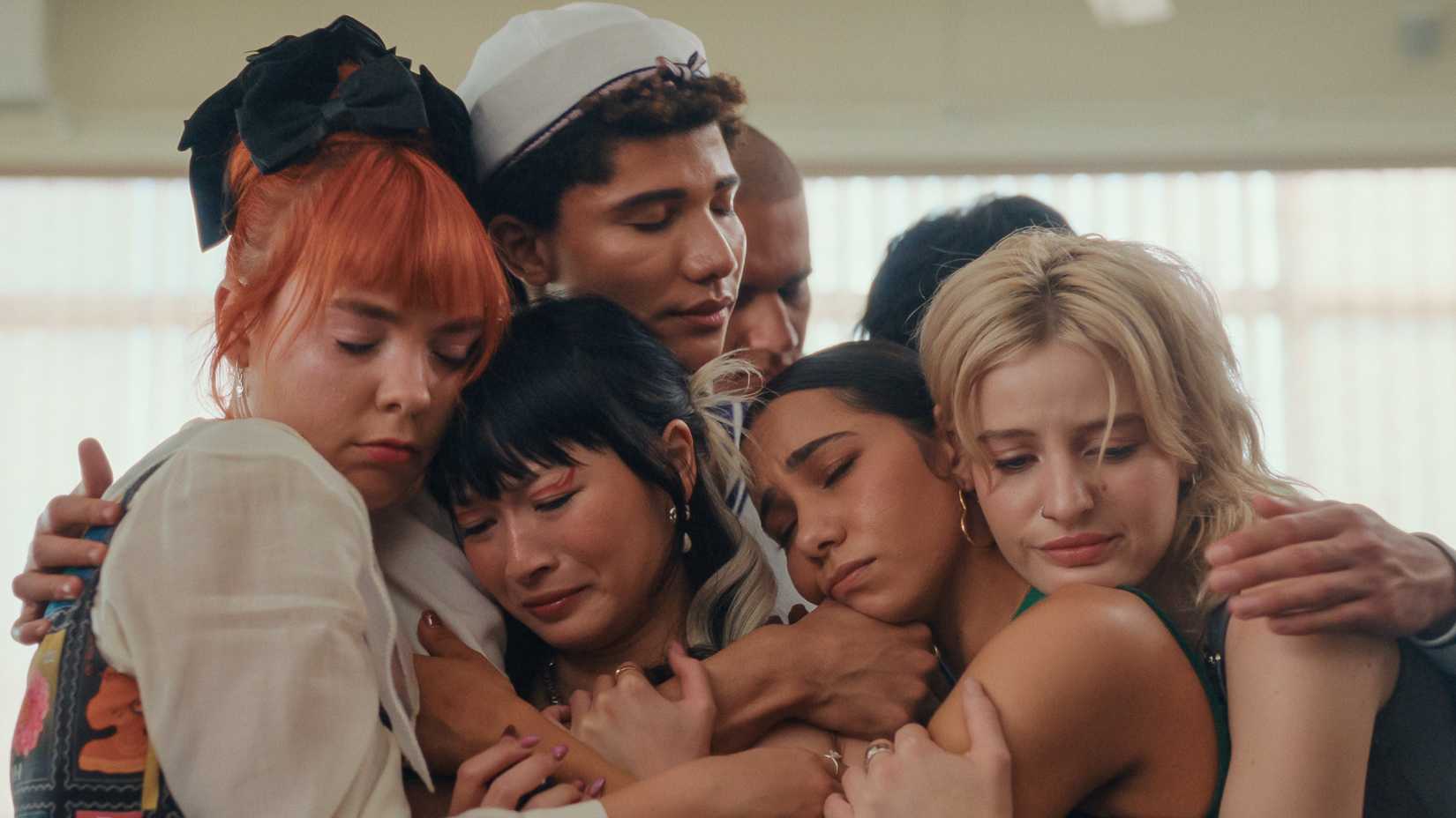 Quinni, Sasha, Darrne, Missy, Harper, and Cash in a group hug in Heartbreak High season 3