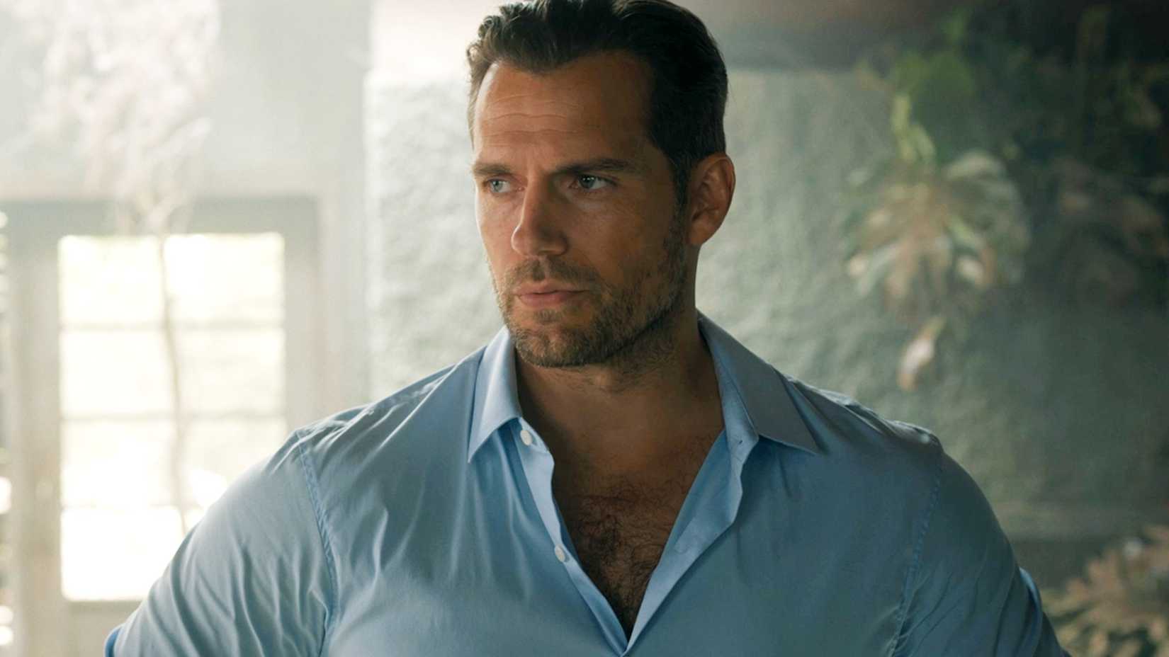 henry cavill is looking to the side in in the grey