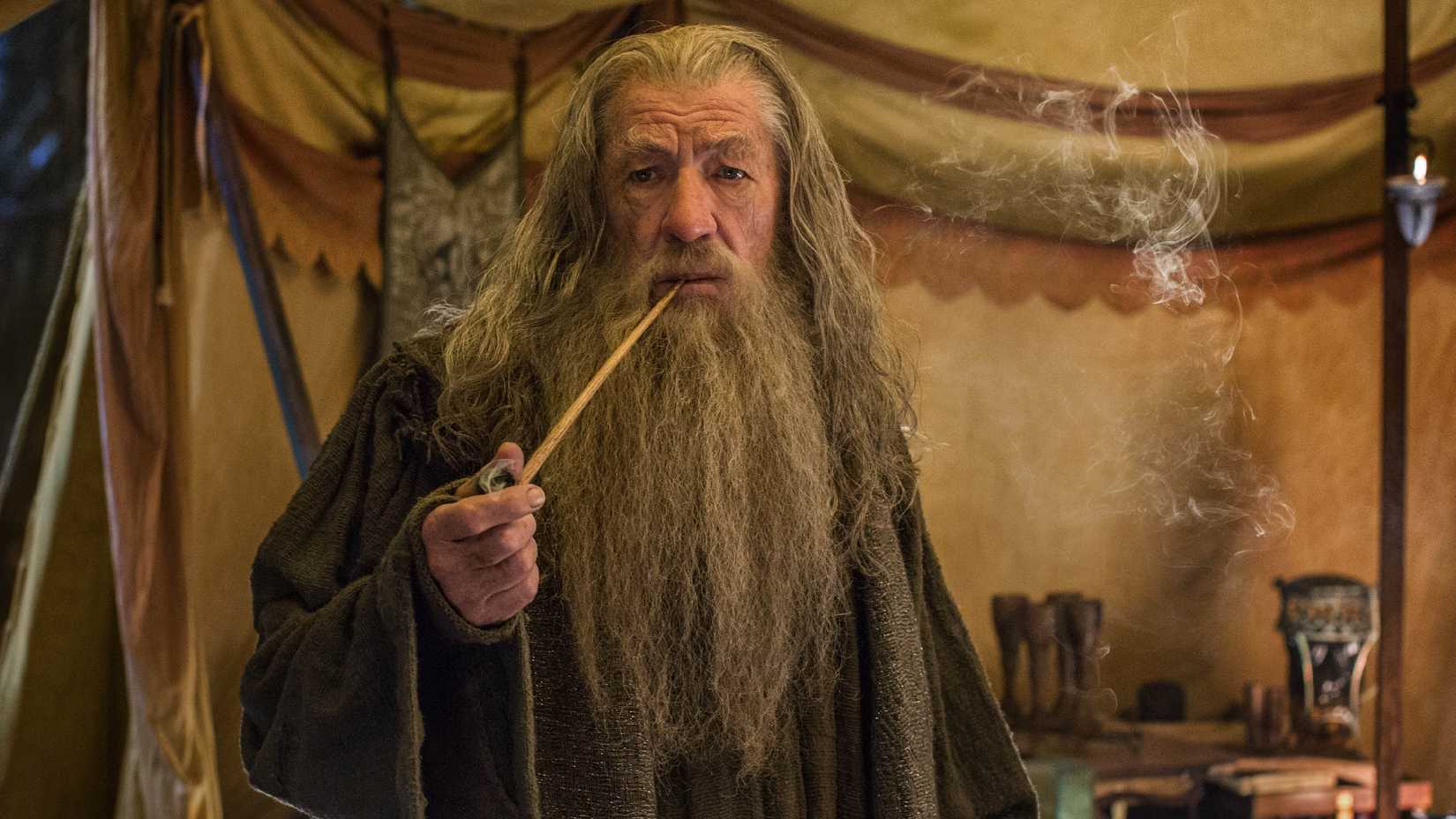 Ian McKellen as Gandalf smoking a pipe in The Hobbit: The Battle of Five Armies.