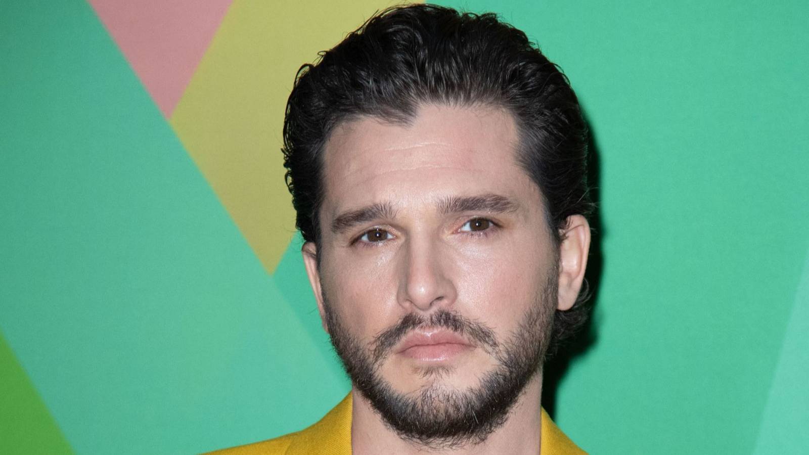 Kit Harington posing at the Louis Vuitton Menswear Fall-Winter 2023-2024 show as part of Paris Fashion Week in Paris, France on January 19, 2023.