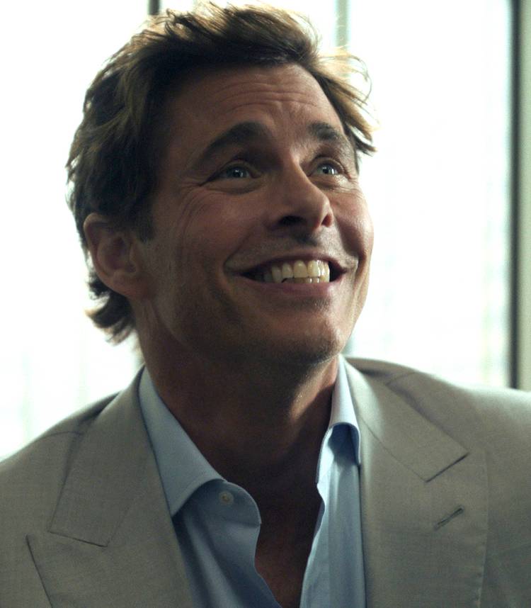 james marsden s owen smiling exaggeratedly in your friends neighbors season 2 vertical