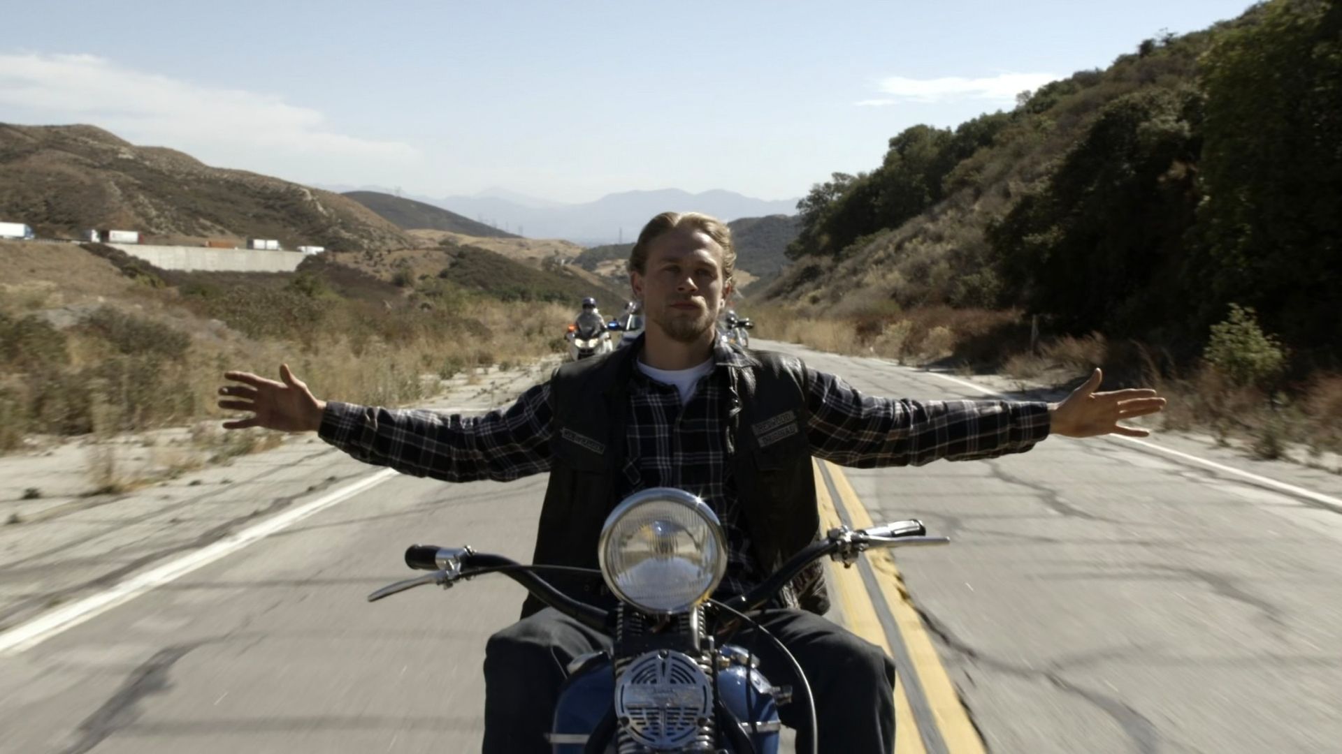 Jax riding on his bike with no hands in Sons of Anarchy.