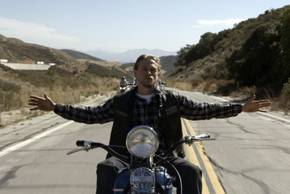Jax riding on his bike with no hands in Sons of Anarchy.