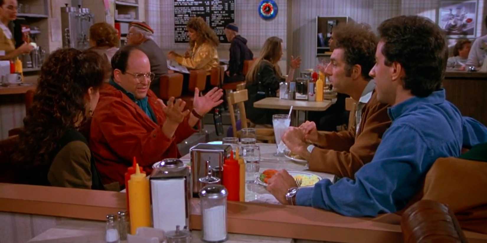 jerry kramer george and elaine sitting in monk s cafe in seinfeld