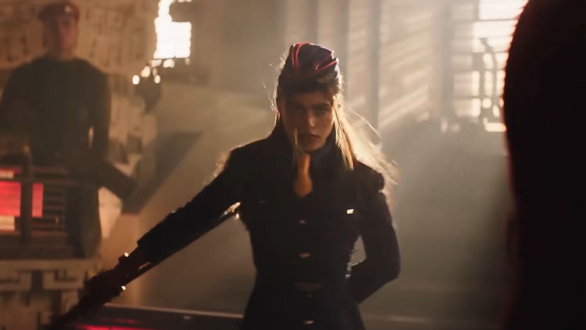 Juli wearing her uniform holding a staff in Street Fighter 2026