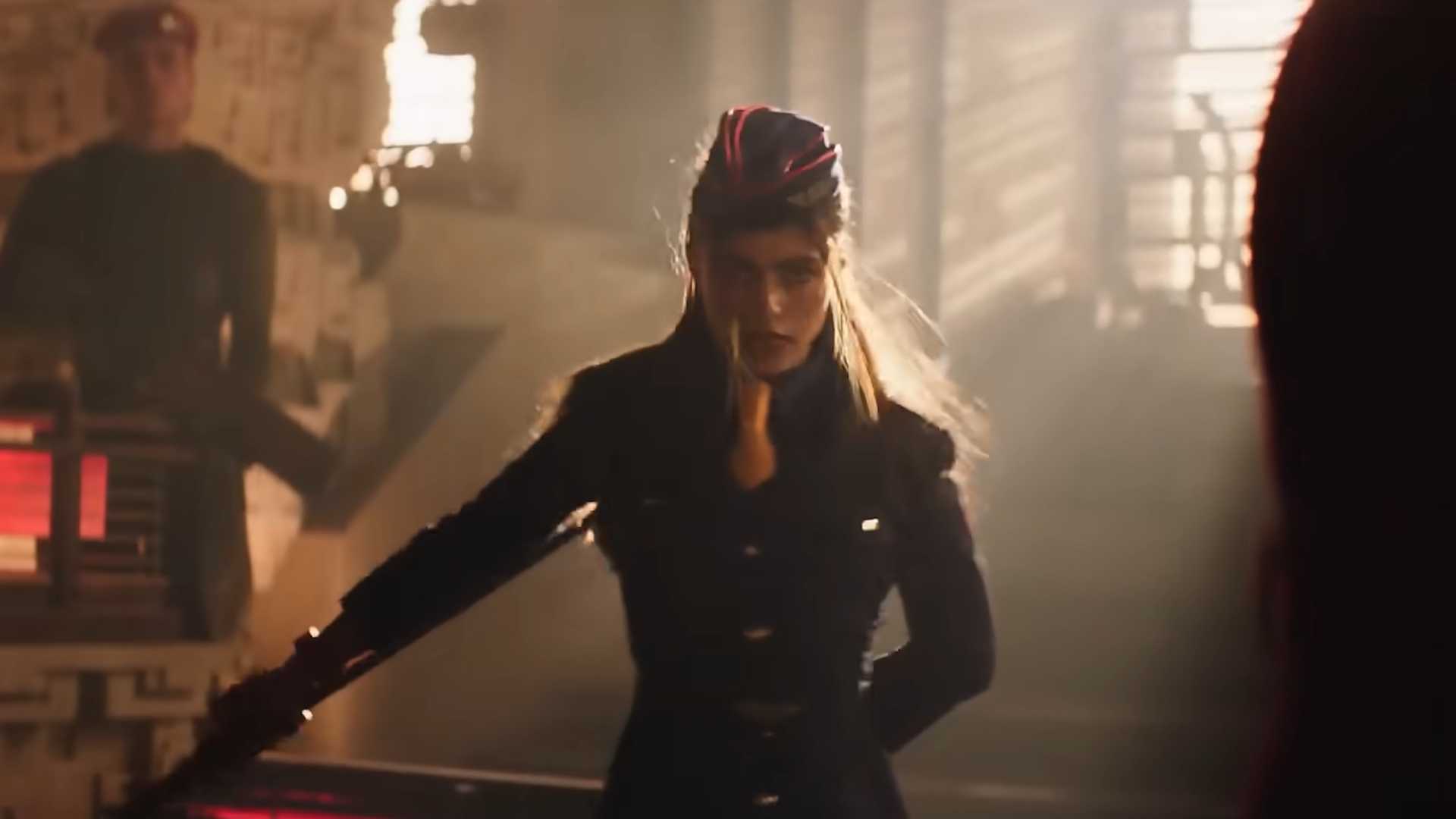 Juli wearing her uniform holding a staff in Street Fighter 2026