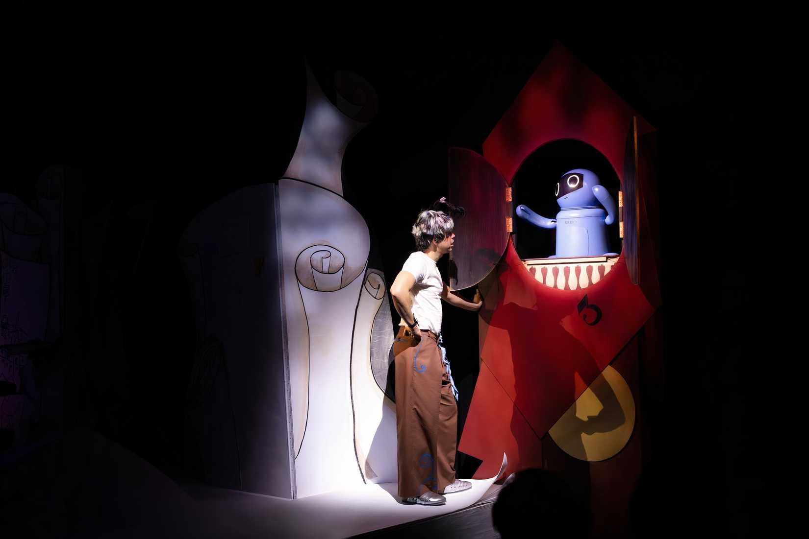 Julio Torres talks to a purple puppet in HBO special Color Theories by Julio Torres