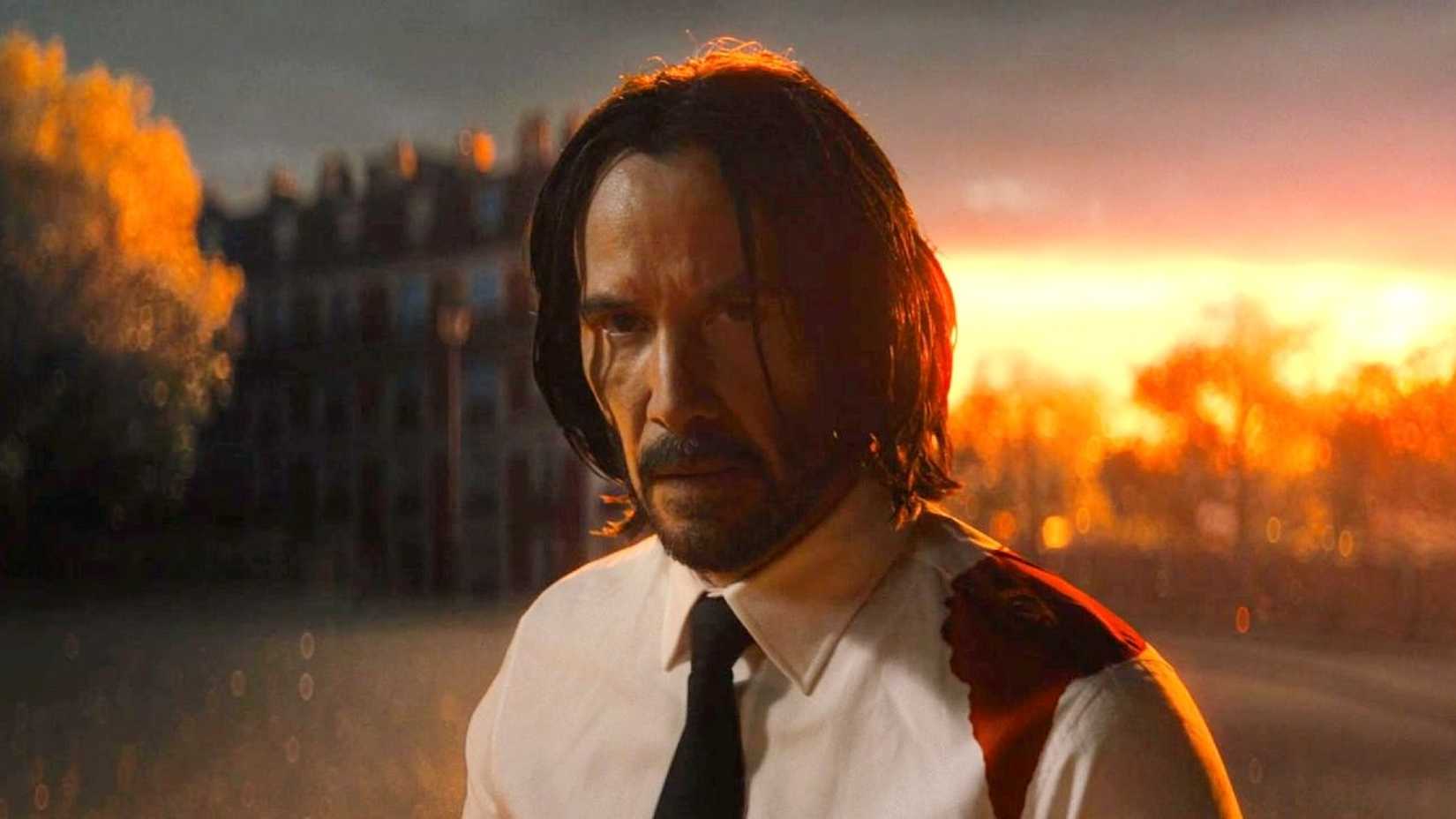 Keanu Reeves at the end of John Wick Chapter 4