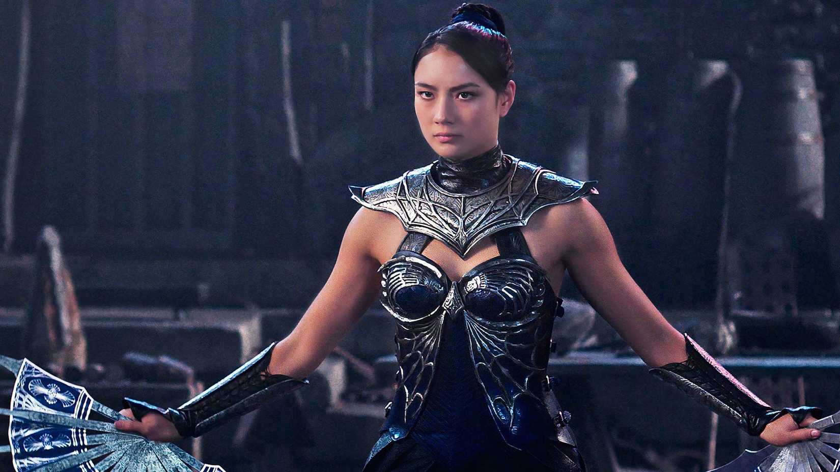 Kitana pronta para o combate segurando seus leques em Mortal Kombat 2
