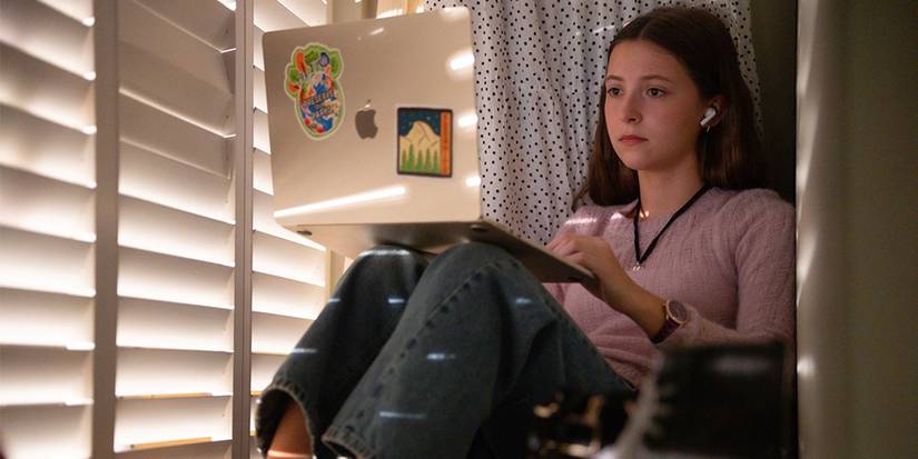 leah in a closet with her laptop in malcolm in the middle life s still unfair