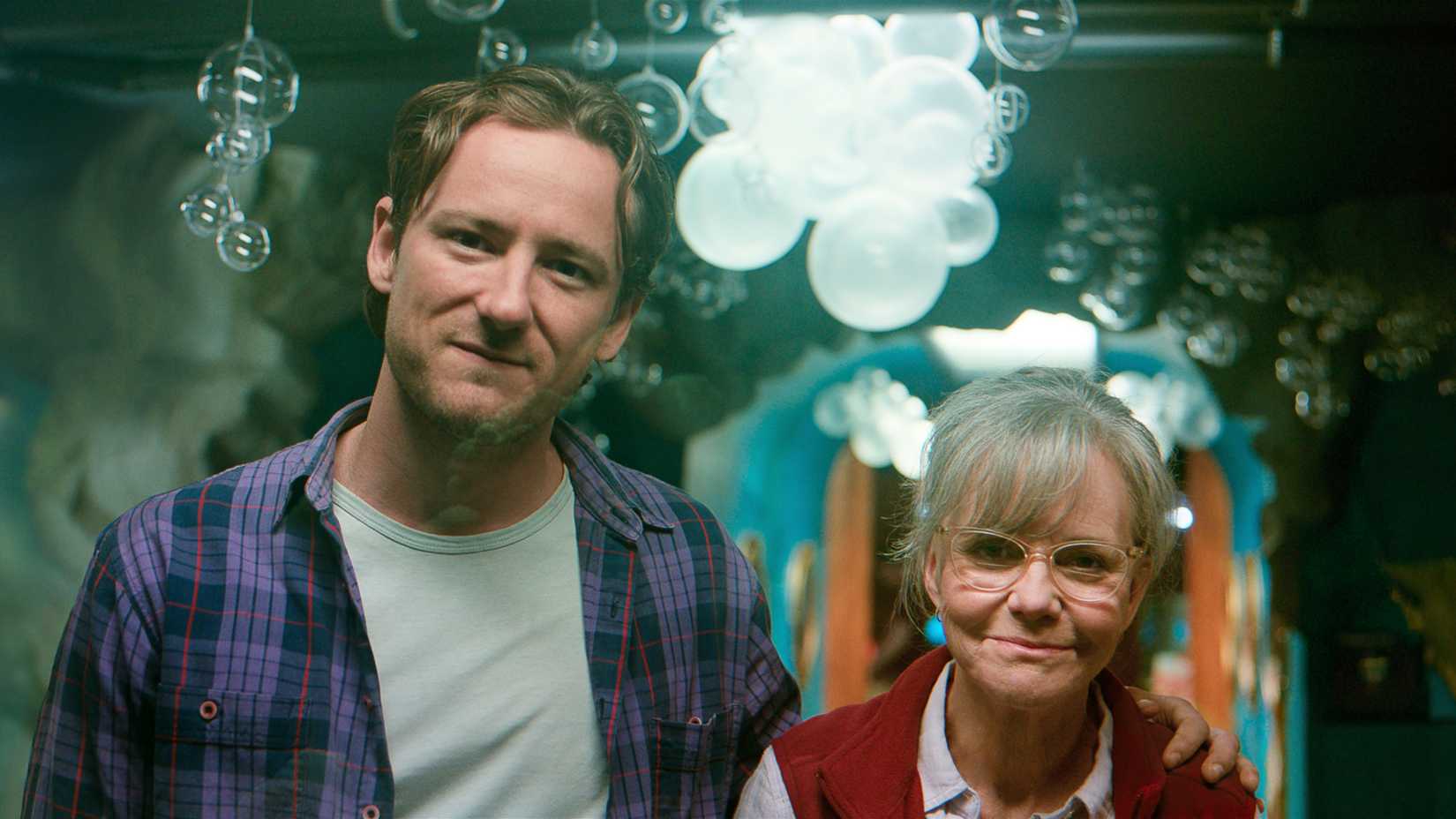lewis pullman and sally field standing together in remarkably bright creatures