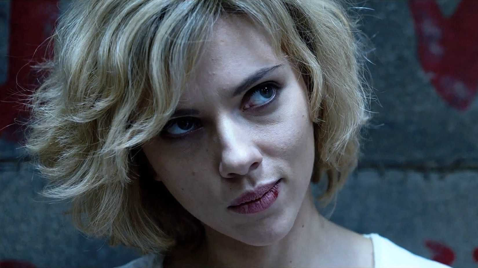 Scarlett Johansson smiling as Lucy