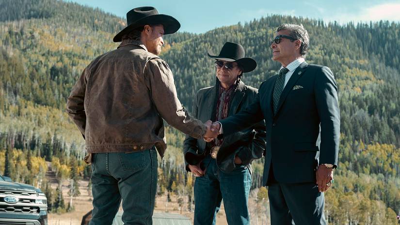 Luke Grimes' Kayce shaking the hand of Gil Birmingham's Rainwater next to Mo Brings Plenty's Mo in Marshals season 1