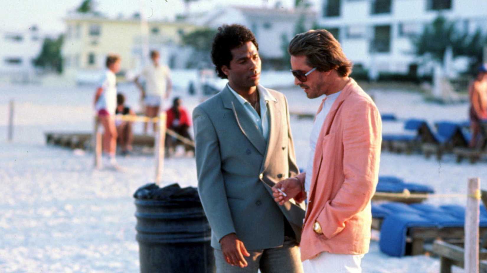 Don Johnson and Philip Michael Thomas as Sonny and Rico at the beach.