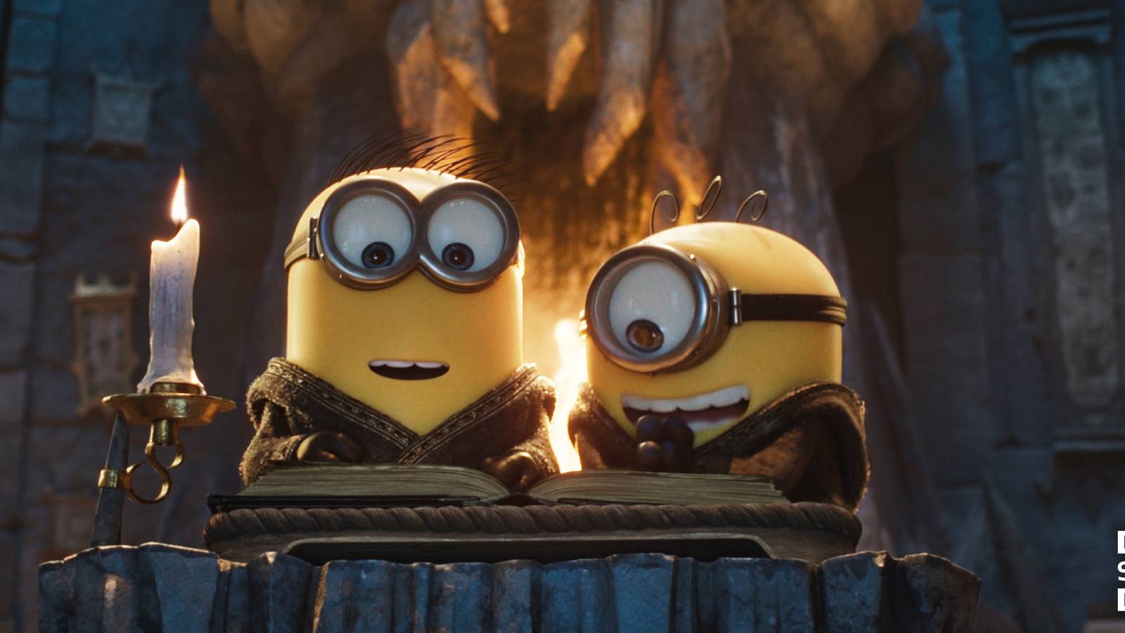 Two Minions at an alter excitedly read an ancient tome in Minions & Monsters
