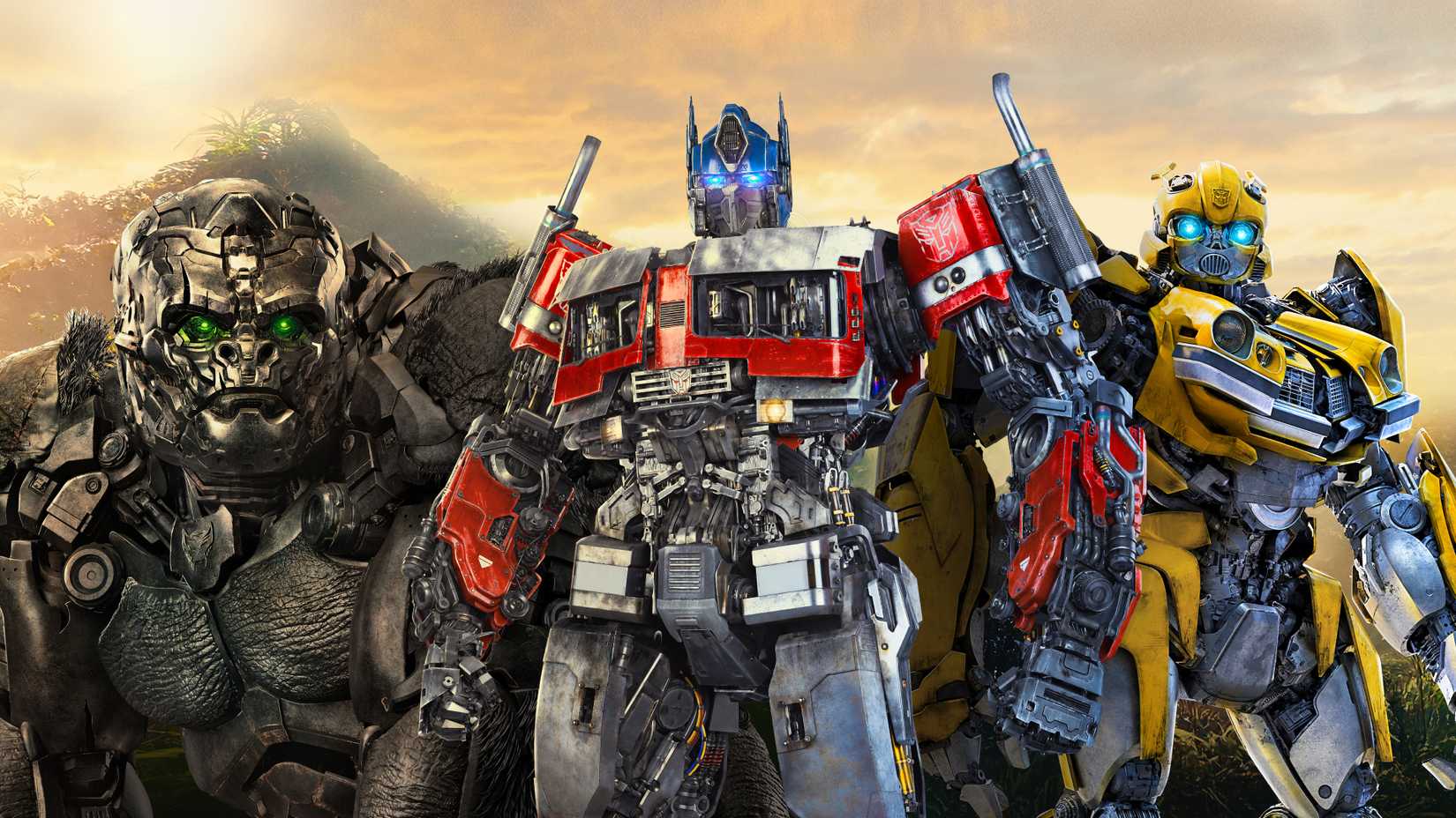 Optimus Primal Optimus Prime and Bumblebee standing together in Transformers Rise of the Beasts