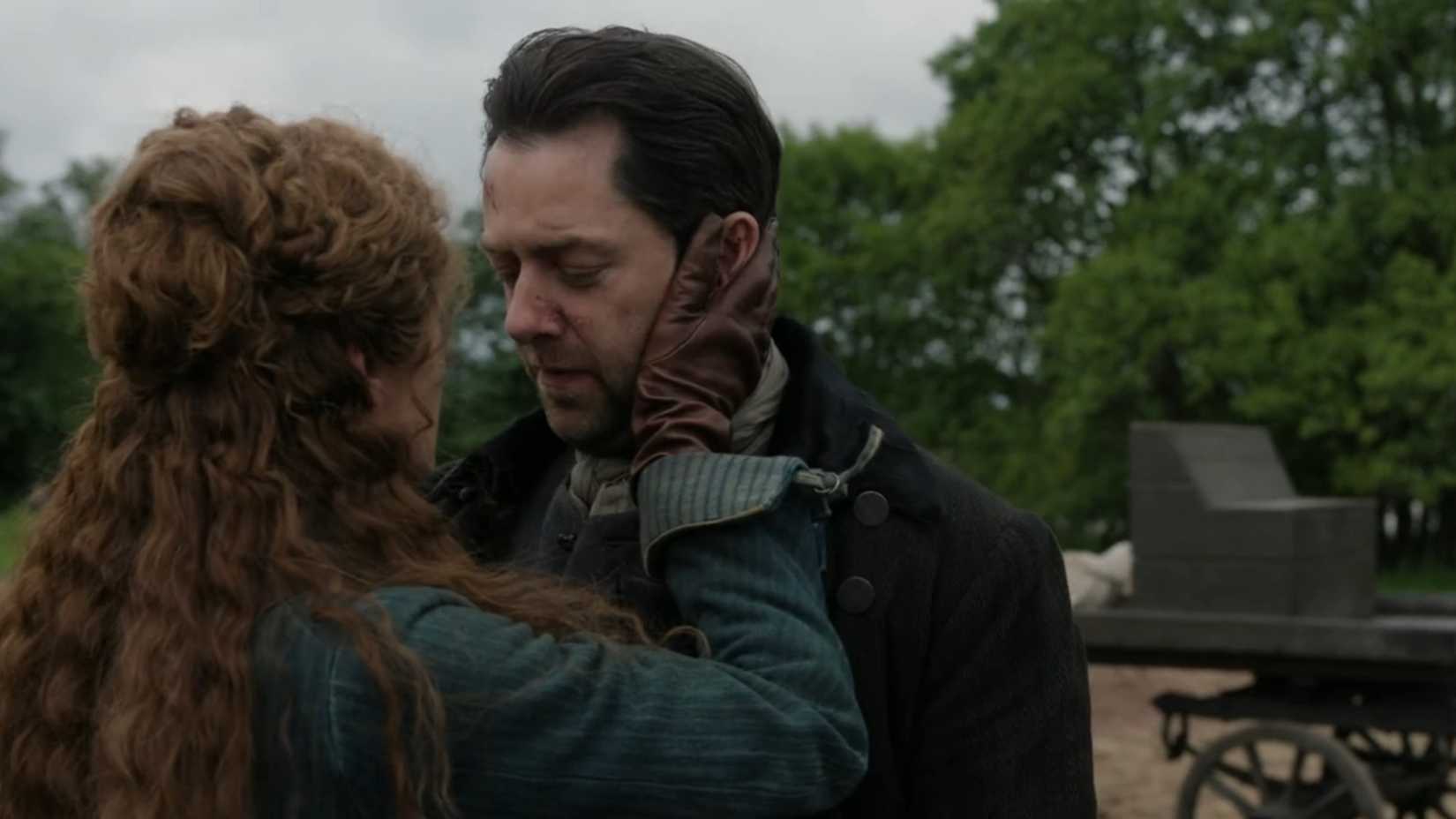 Jamie Makes A Deal With The Devil 1 Roger and Brianna embracing in Outlander season 8