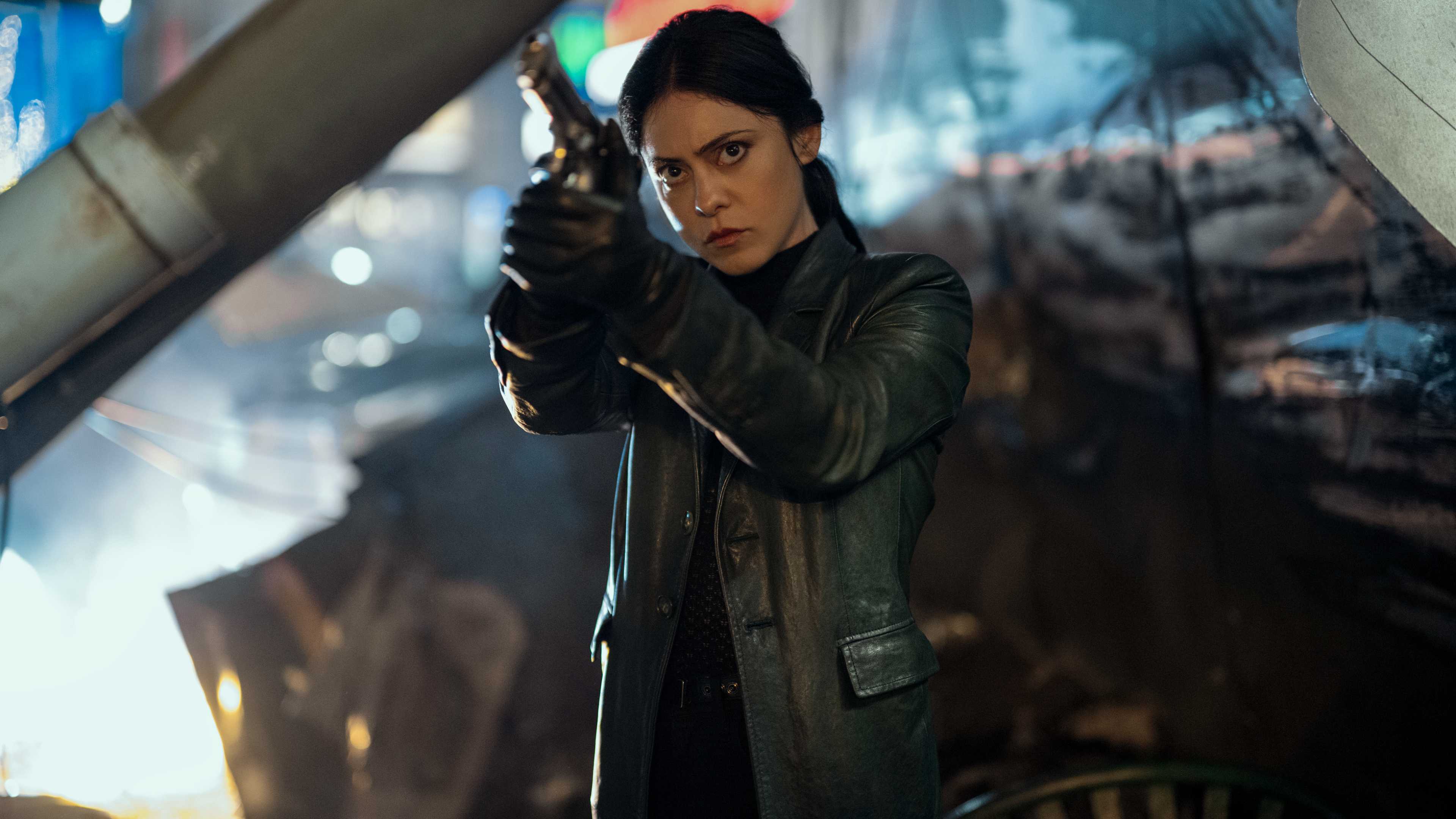 Rosa Salazar as Zen holding a gun in Play Dirty