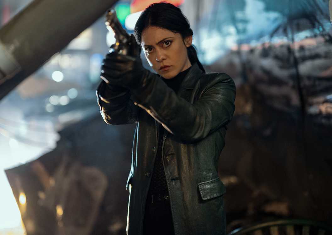 Rosa Salazar as Zen holding a gun in Play Dirty