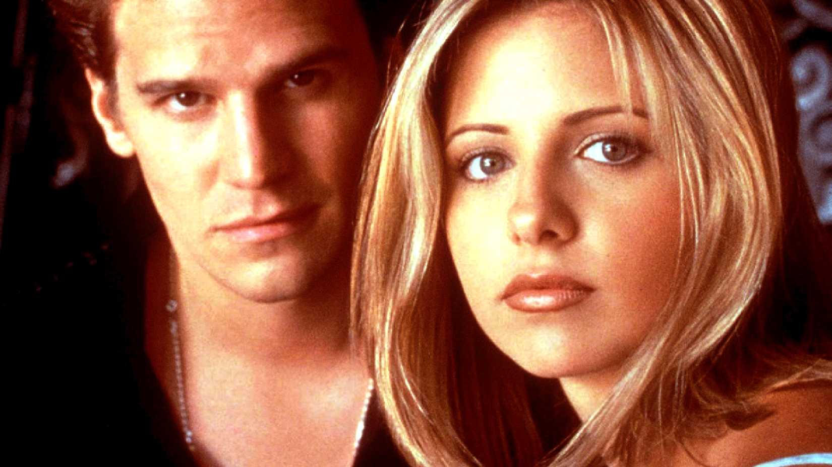 Sarah Michelle Gellar's Buffy the Vampire Slayer and David Boreanaz's Angel look at the camera together