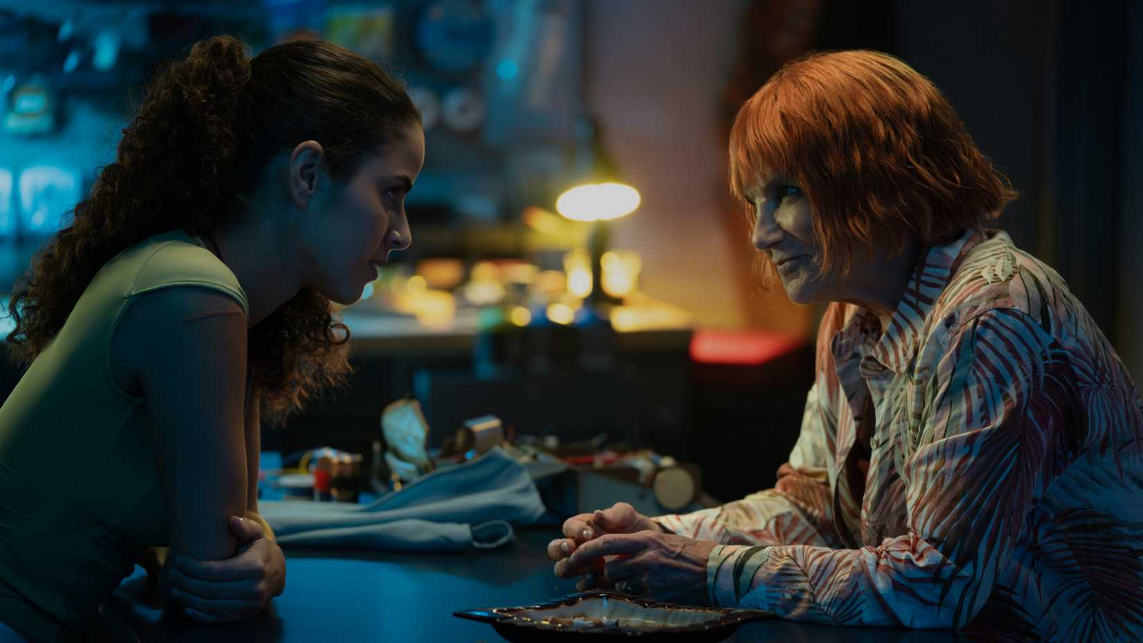 shannon gisela as etta and tovah feldshuh as lena looking at each other in m i a