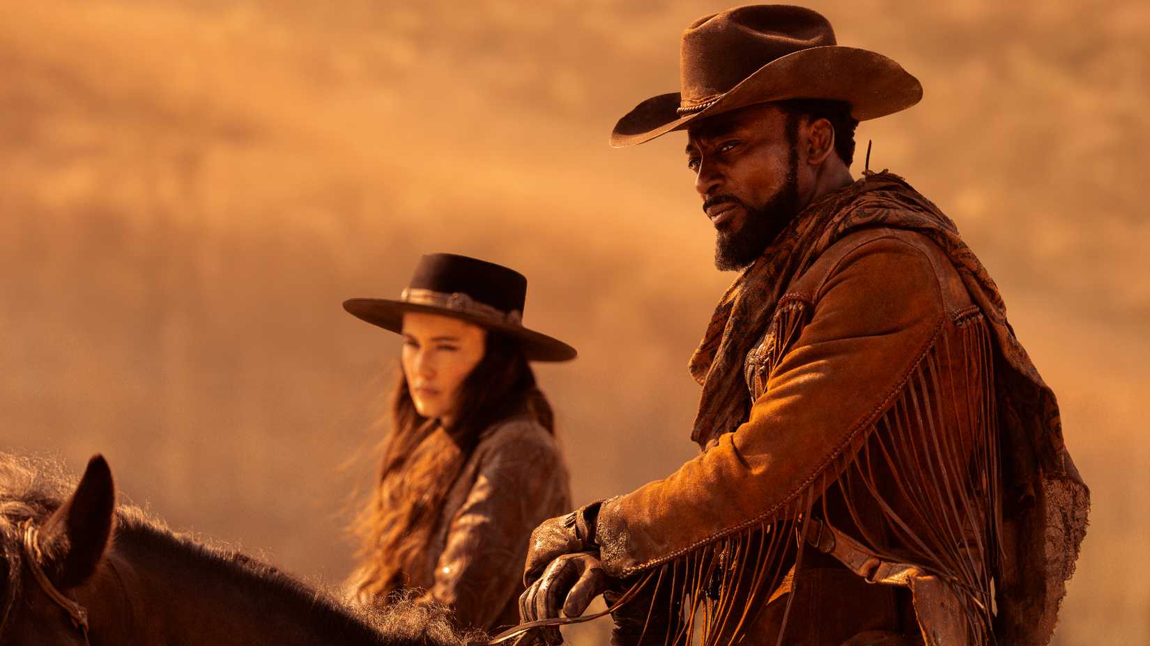 La'an and M'Benga on horseback