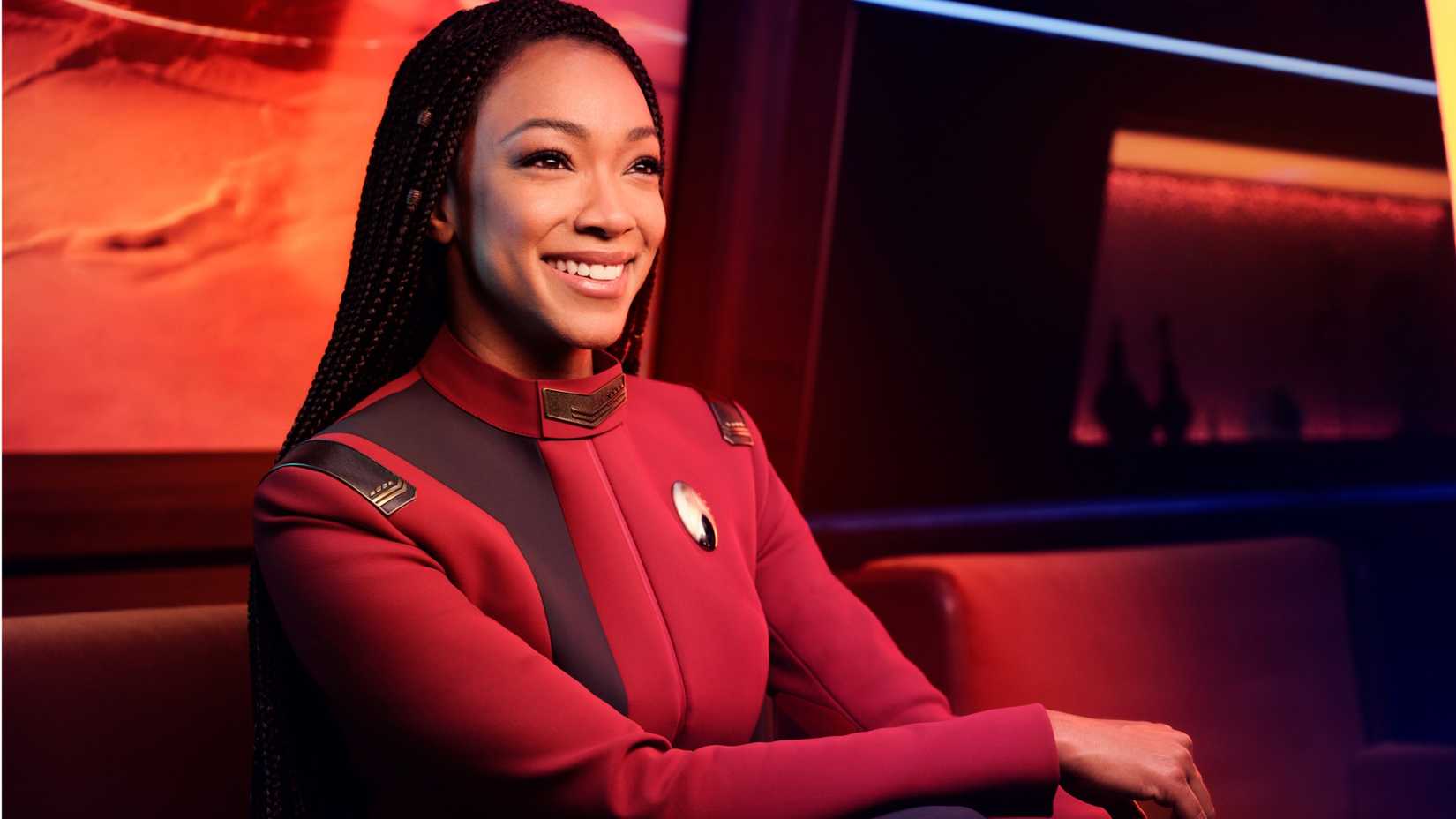 Sonequa Martin-Green as Michael Burnham, smiling, in Star Trek Discovery season 5 promoshot