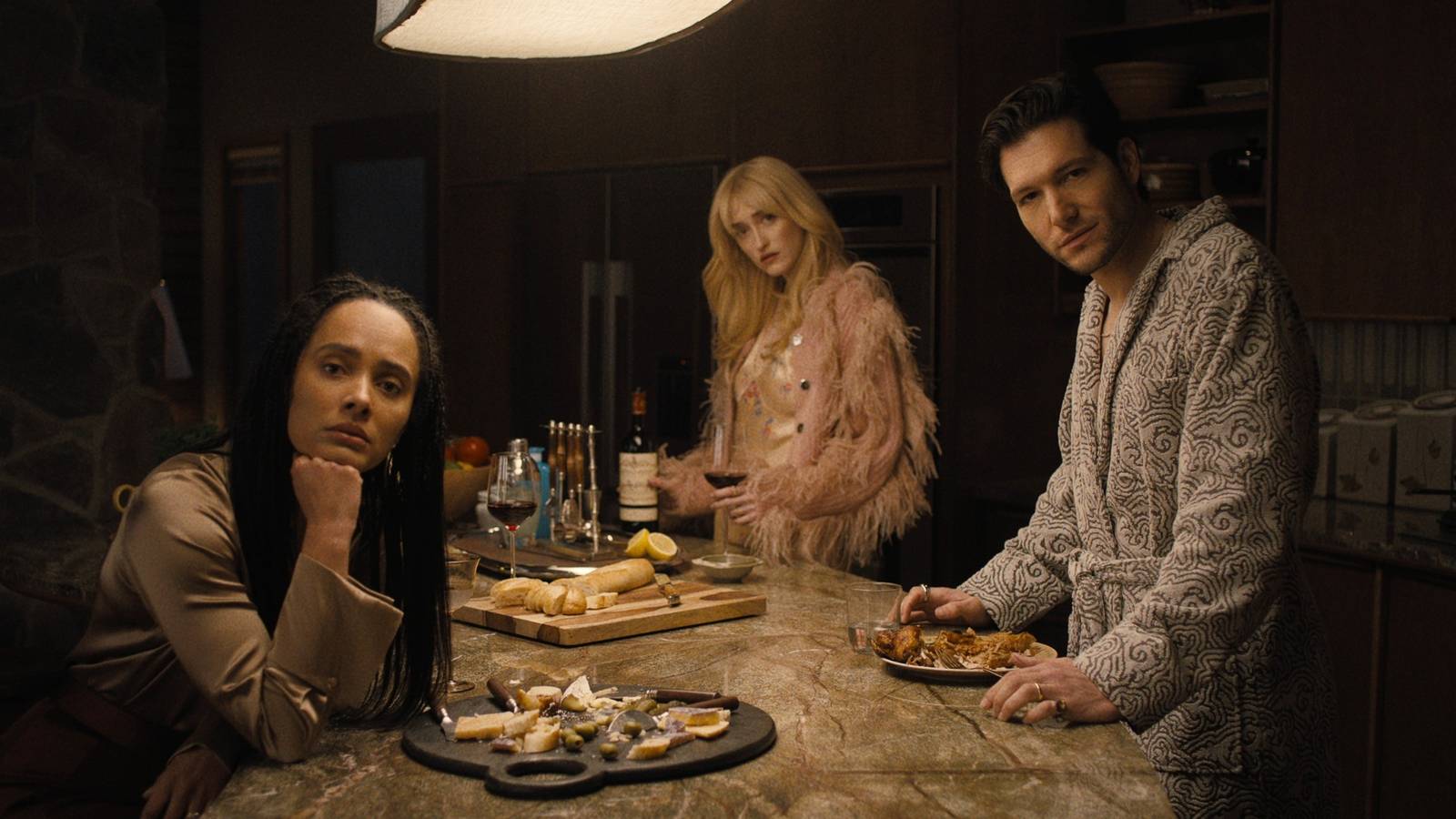 Karla Crome, Gus Birney and Jeff Wilbusch in Something Very Bad Is Going to Happen (2026)