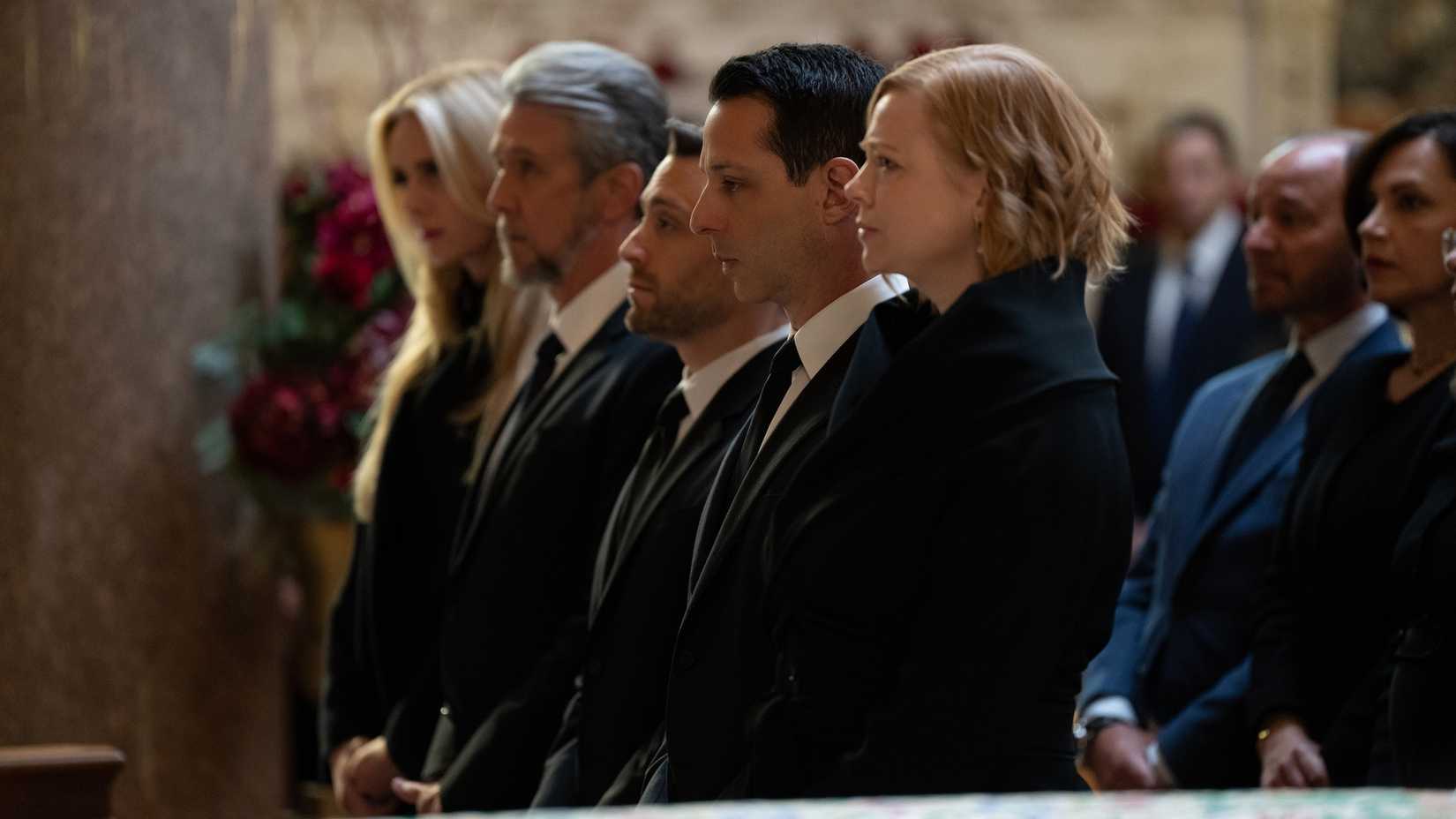 The cast of Succession standing in a line