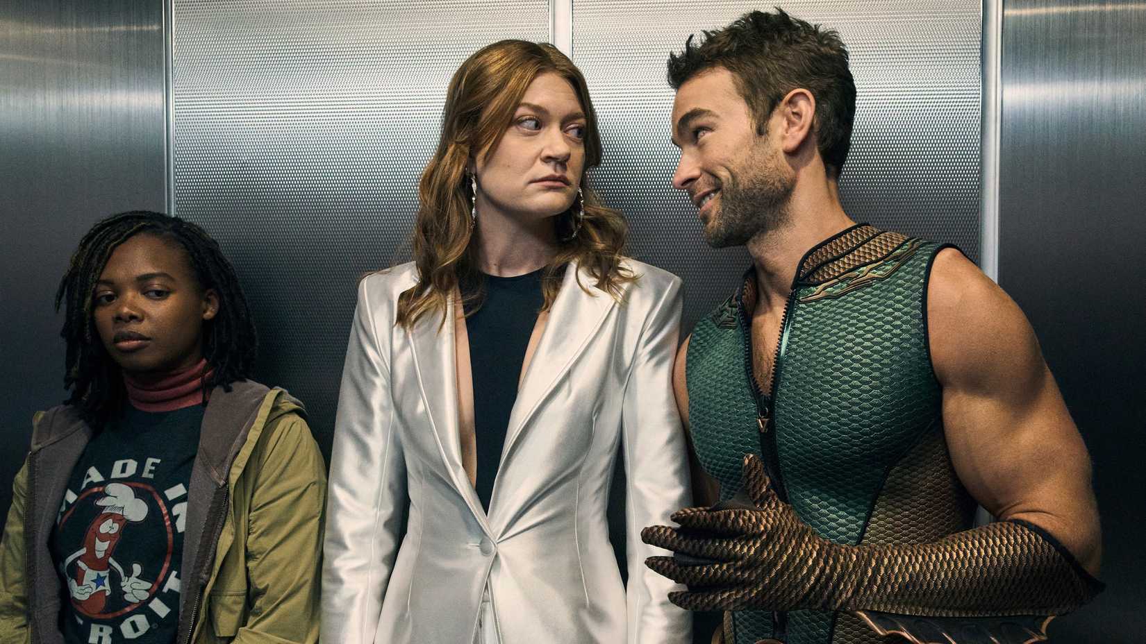 The Deep and Ashley looking at each other inside an elevator while Sister Sage stands beside them in The Boys
