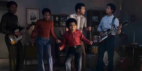 The Jackson 5 performing in their living room in Michael