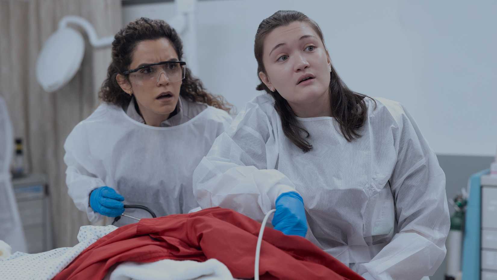 Doctors Al-Hashimi and Santos Working on a Patient in The Pitt