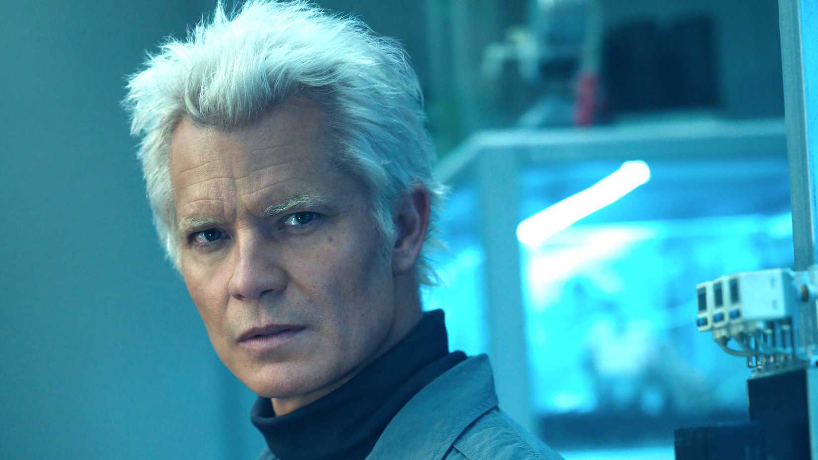 timothy olyphant s kirsh looking curiously at something in alien earth season 1