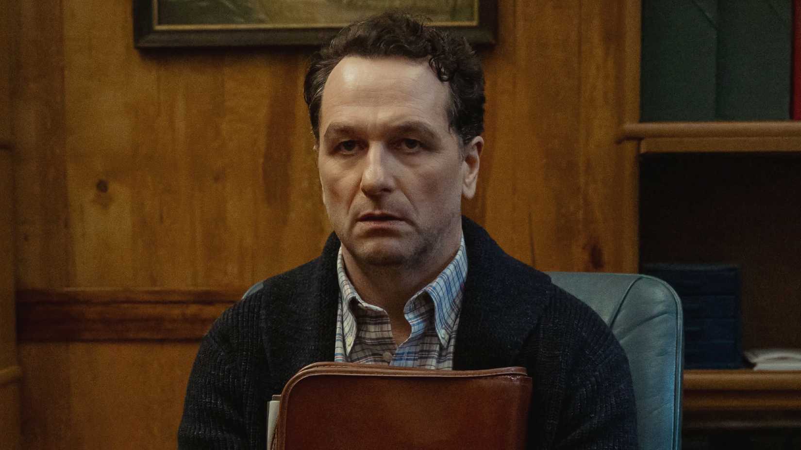 Tom Loftis has a blank look on his face in Widow's Bay