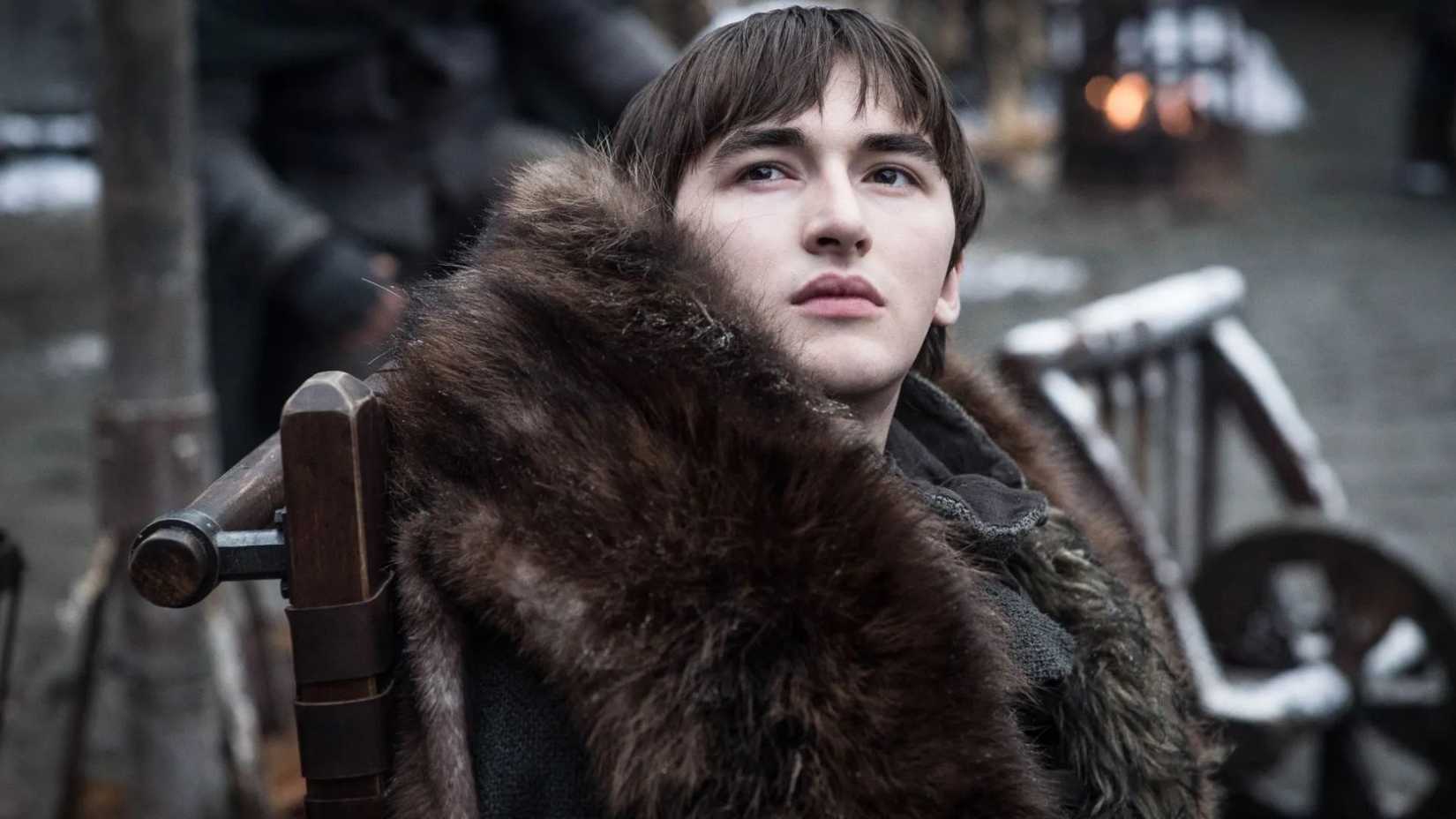 Bran Stark in a brown fur coat