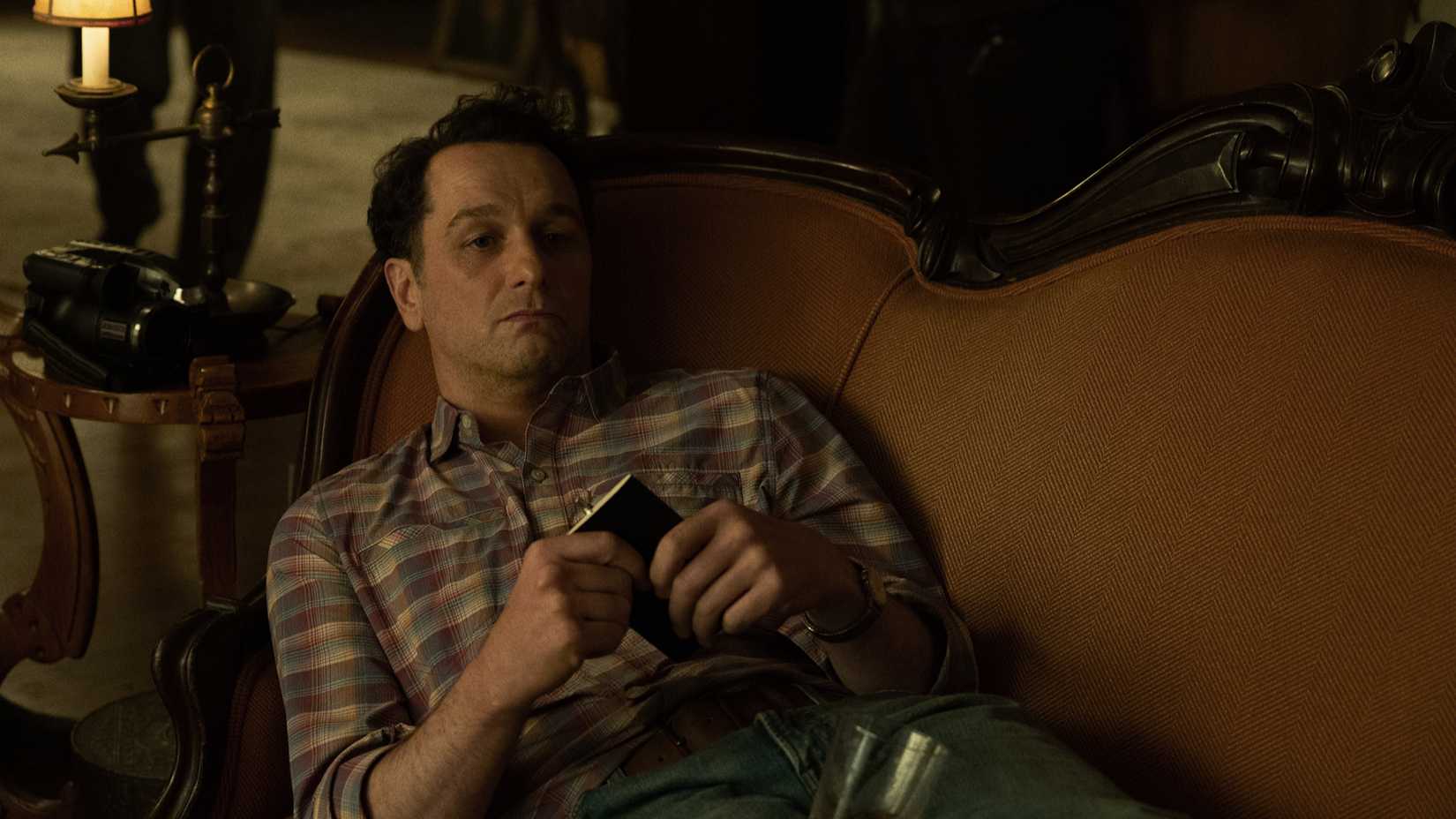 Matthew Rhys as Tom lying down in Widow's Bay