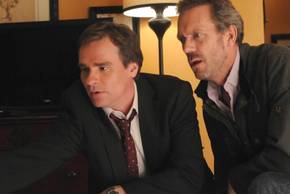 Wilson (Robert Sean Leonard) and House (Hugh Laurie) staring at something in shock in House