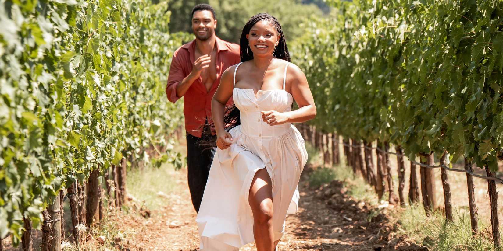 You, Me & Tuscany Michael and Anna running through the vineyard