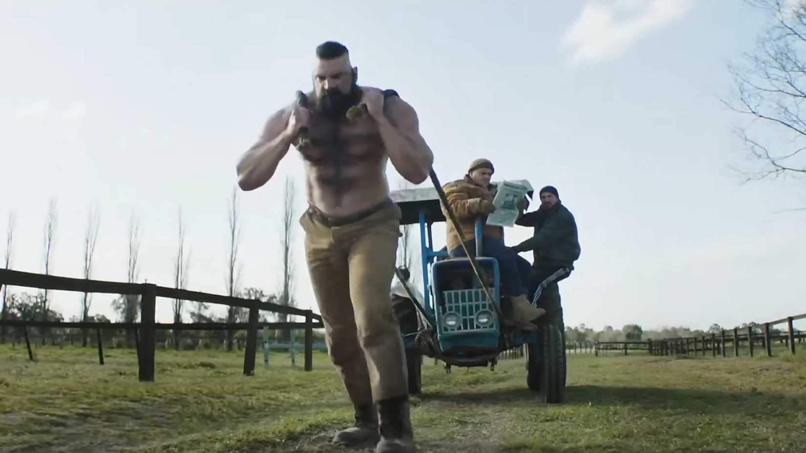 zangief pulling a tractor with two people inside in street fighter 2026