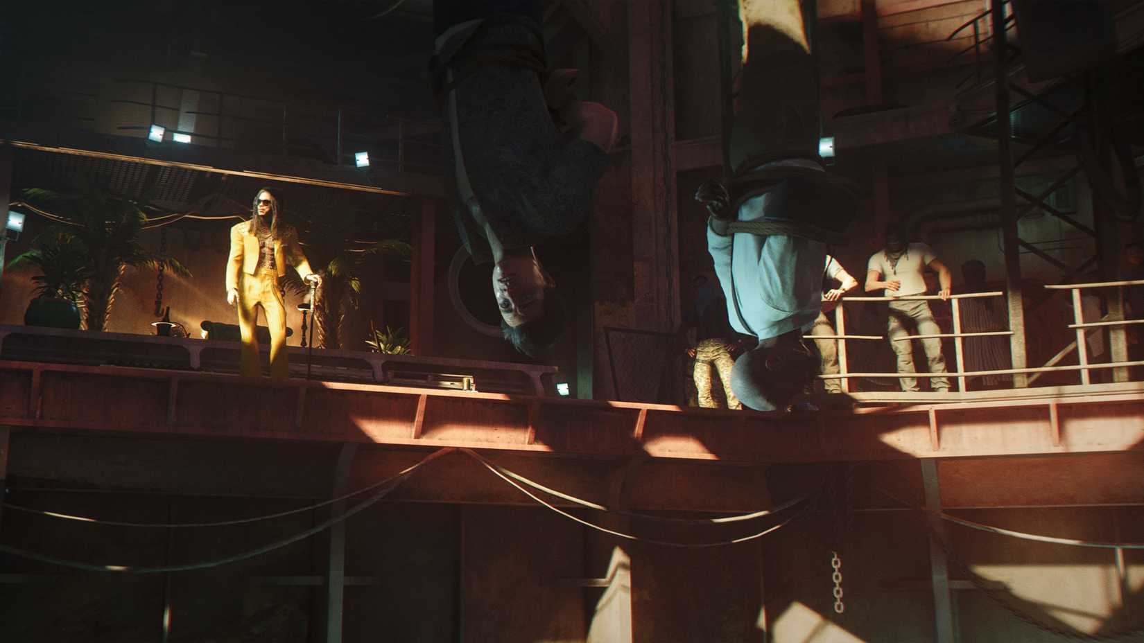 Bond and Greenway dangling over a pit of crocodiles in 007 First Light