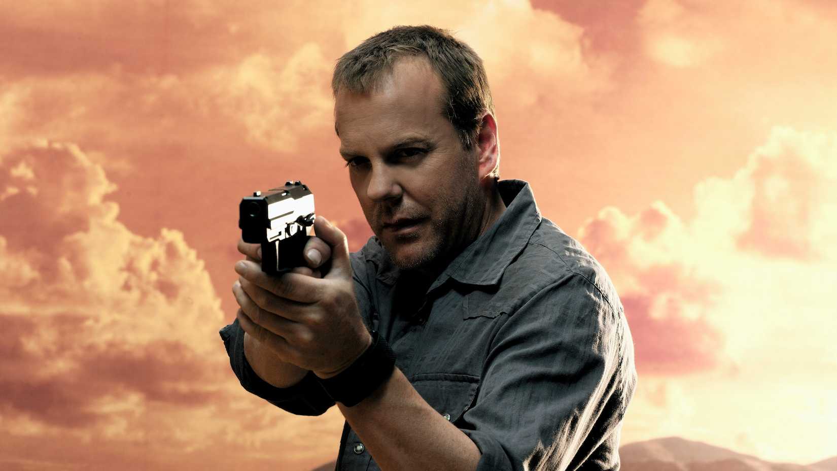 Jack Bauer holding a handgun in 24 promo shot