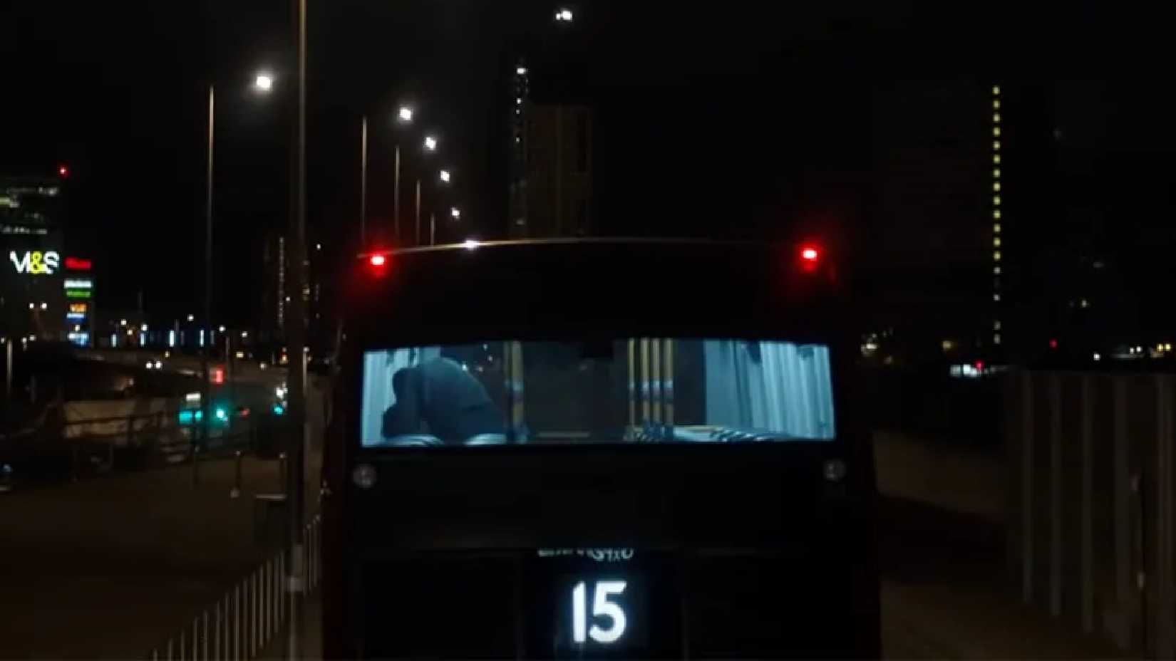 a still from Series 5, of luthor showing a london bus