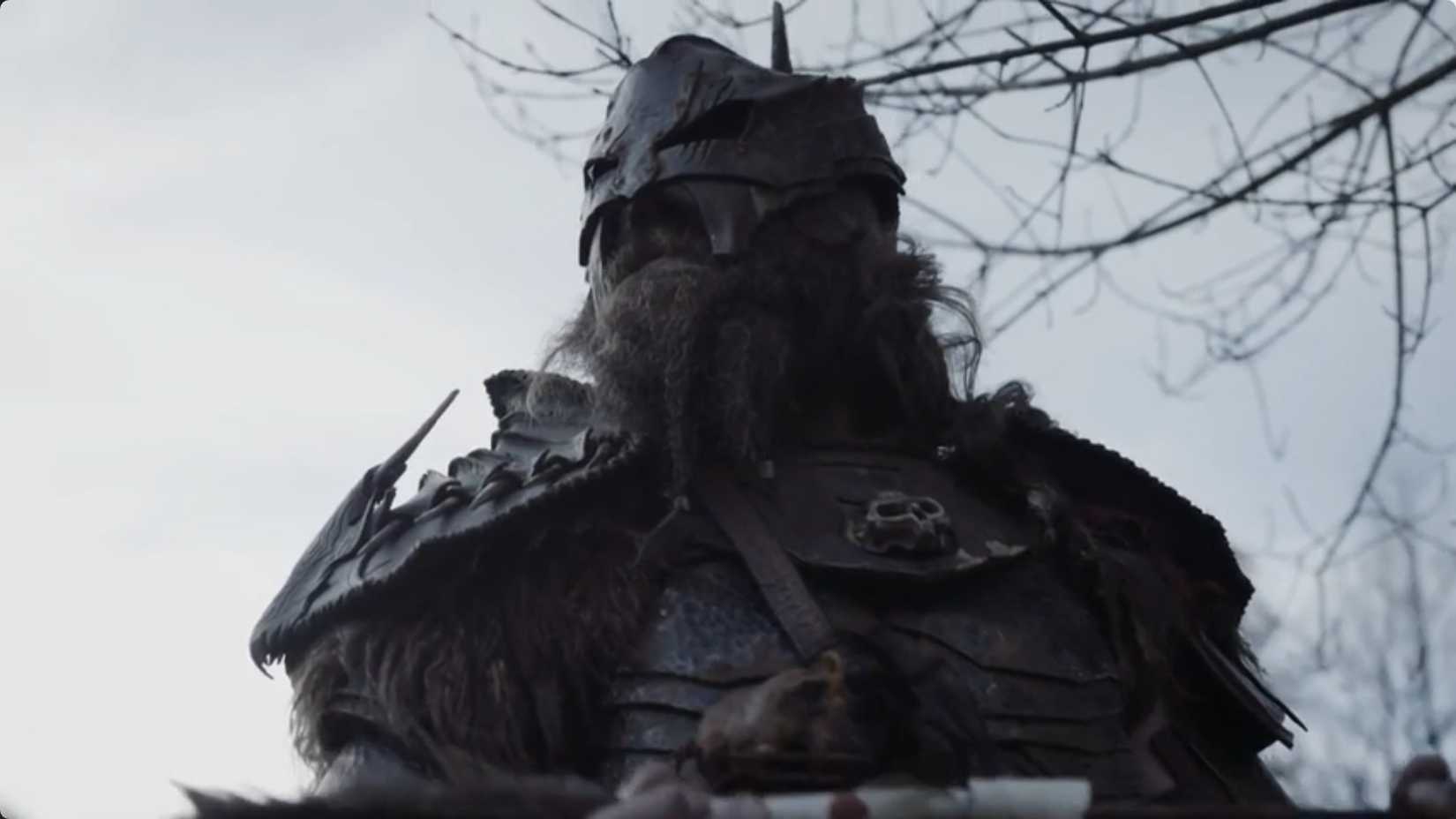 A warrior in full metal armor in The Head Hunter
