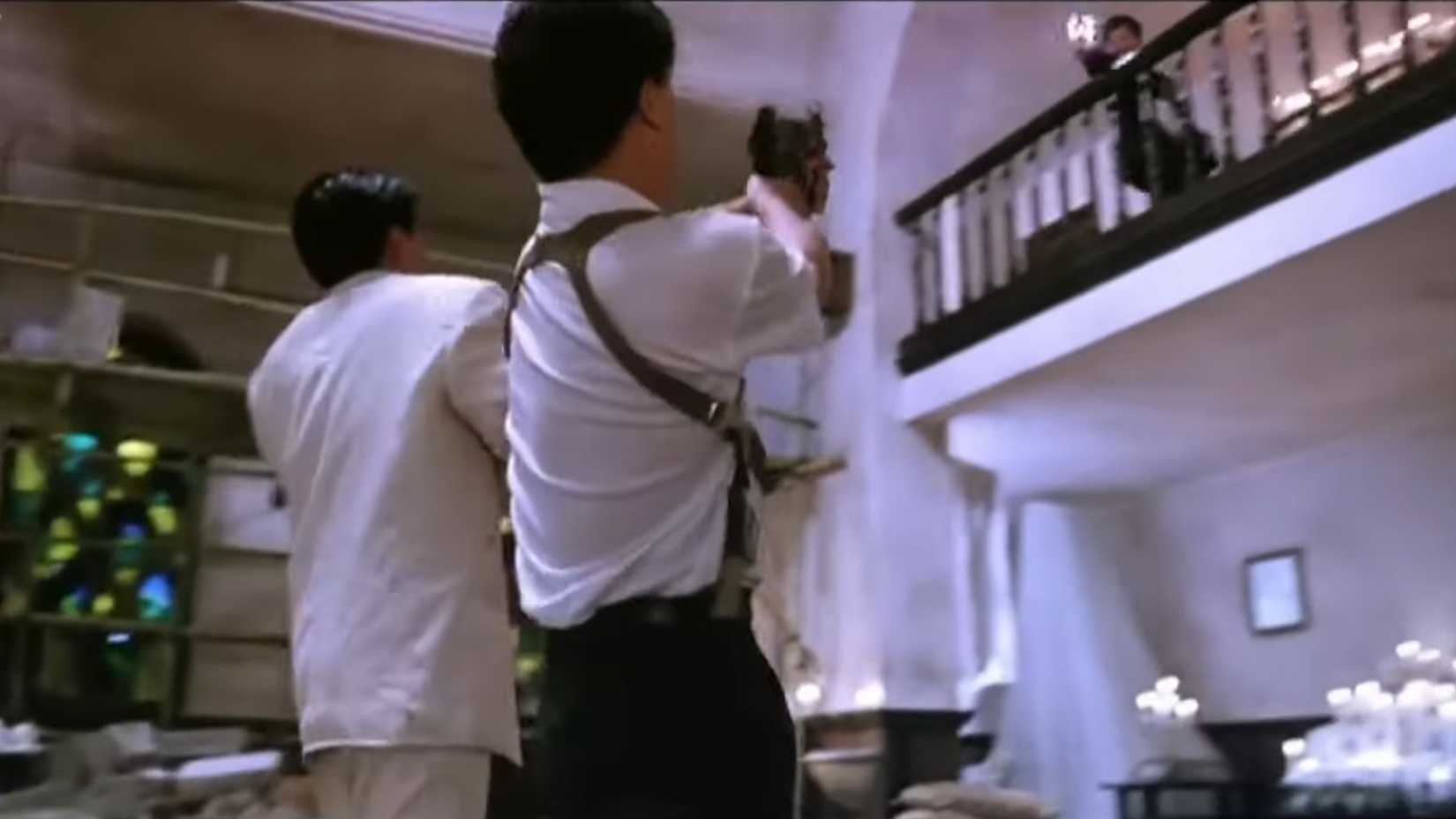 Ah Jong and Inspector Lee shooting mobsters on the church balcony in The Killer