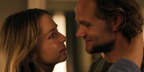 Allie and Bruce staring into each other's eyes as Allie sheds a tear in Affection