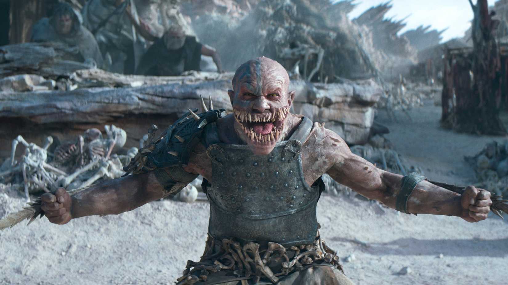 Baraka yelling and brandishing his arm blades in Mortal Kombat II
