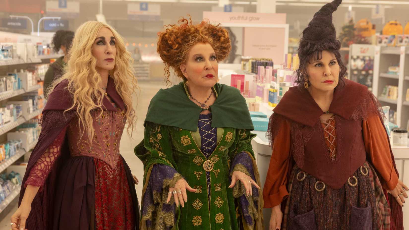 Bette Midler, Sarah Jessica Parker, and Kathy Najimy look shocked in Hocus Pocus 2