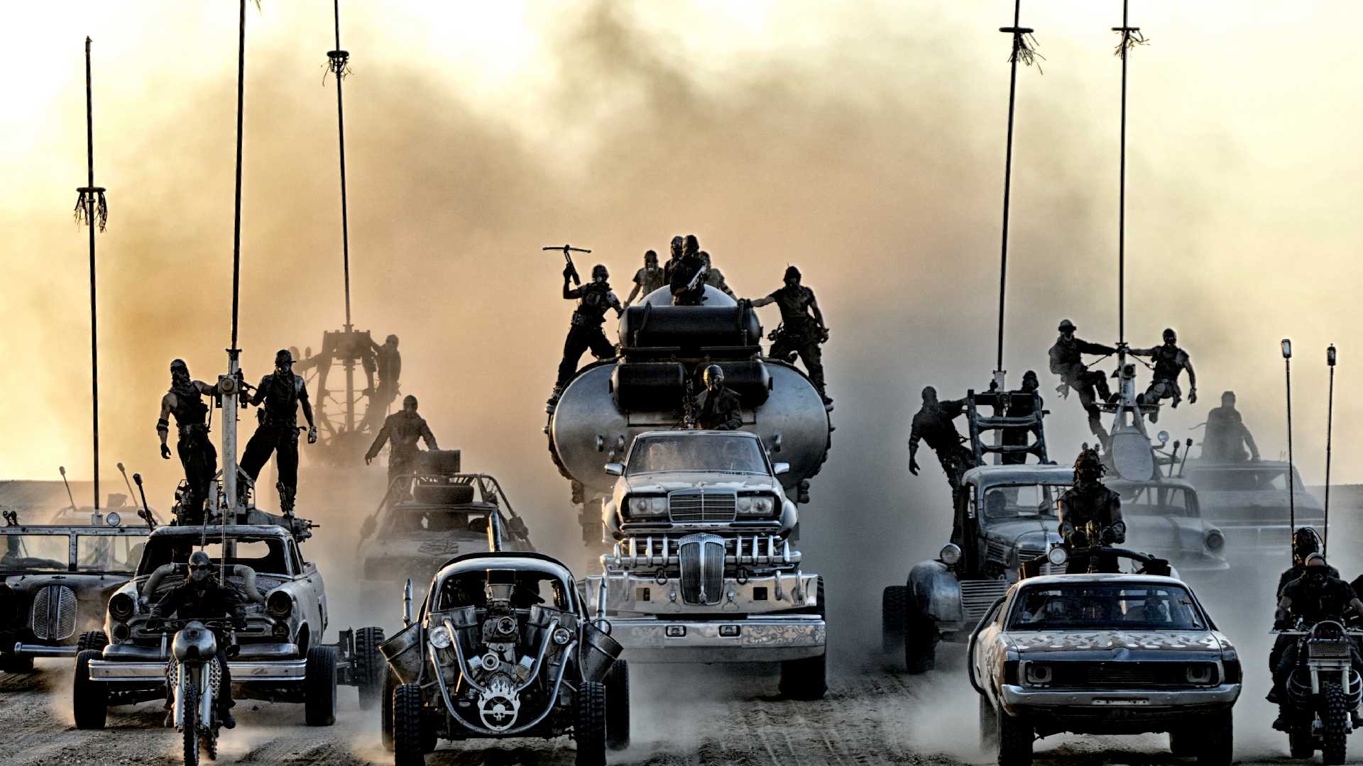 cars-kicking-up-a-dust-cloud-in-mad-max-fury-road 8 Masterpiece Movie Sequels Better Than The Dark Knight