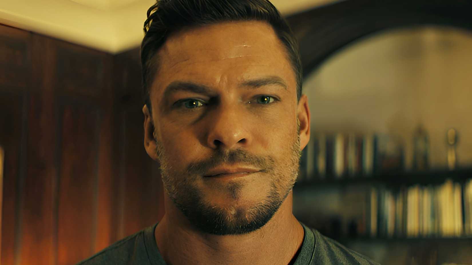 Alan Ritchson’s Jack Reacher looking serious in Prime Video’s Reacher