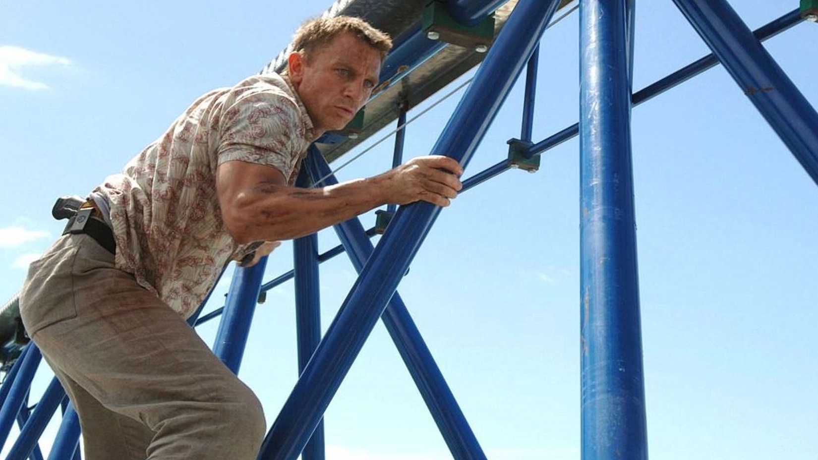 Daniel Craig balancing on a crane in Casino Royale
